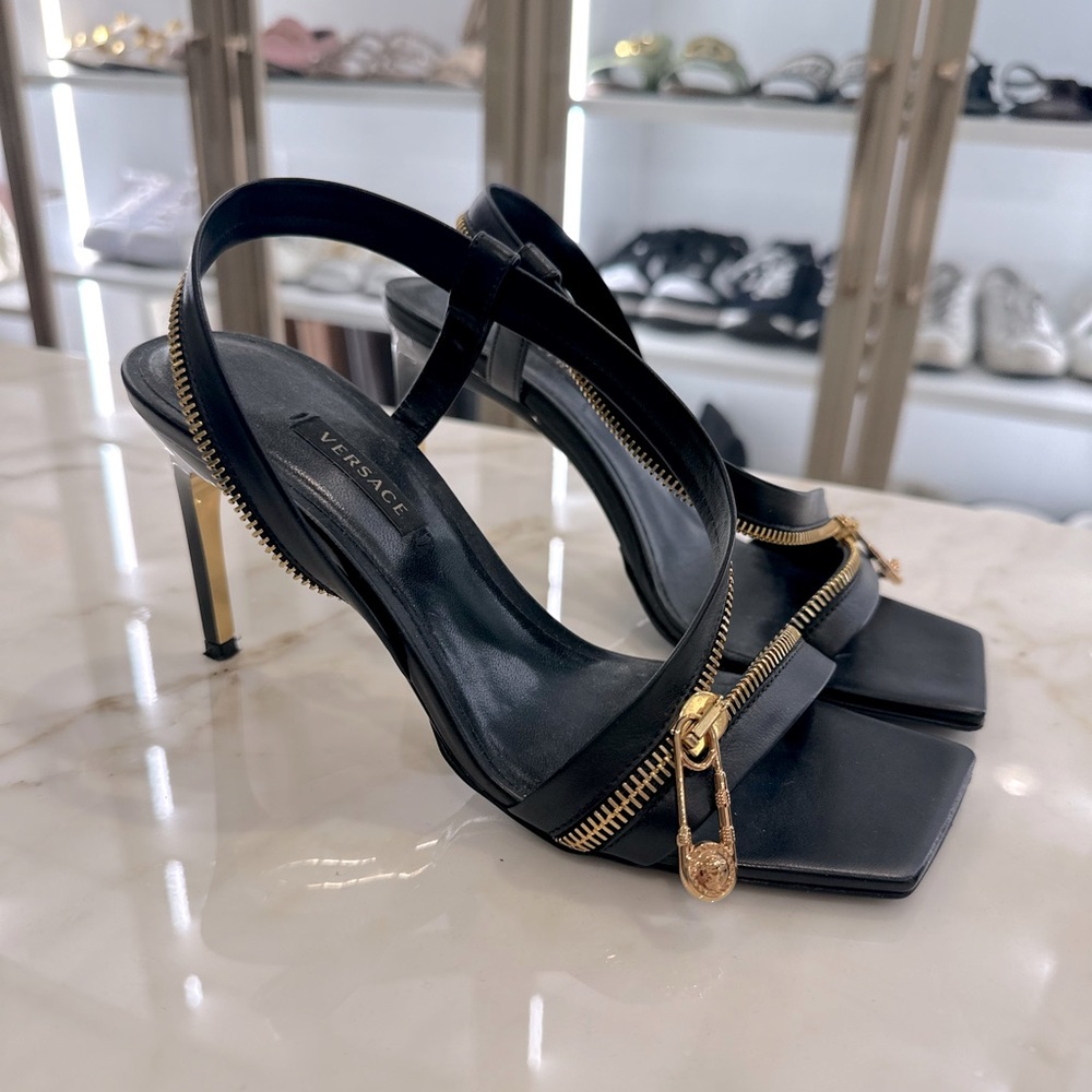 - Versace strappy zipper safety pin sandal with 3.5 inch heel